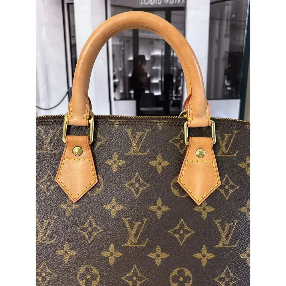 Louis Vuitton Monogram Alma Satchel in Brown and Tan